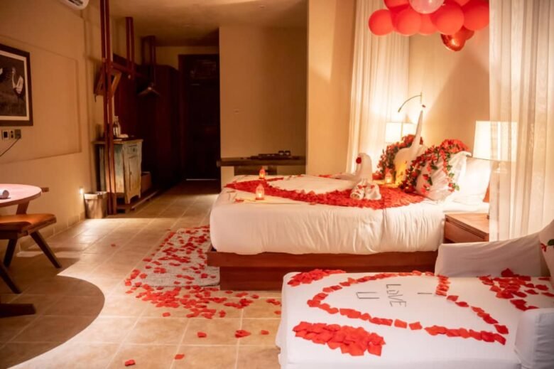 Valentine's Day rose petal heart floor decoration in single room at Entikko Safari Lodge near Murchison Falls Uganda