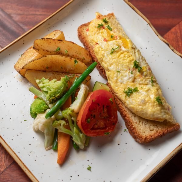 image showing food with rolex a local food popular in africa that is mixed with eggs and fries