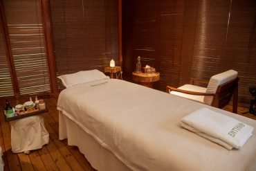 Spa and massage parlour at Entikko Safari Lodge with tranquil decor and private relaxation beds near Murchison Falls
