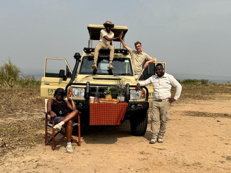 Group of tourists on a game drive at Entikko Safari Lodge in Murchison Falls National Park, Uganda
