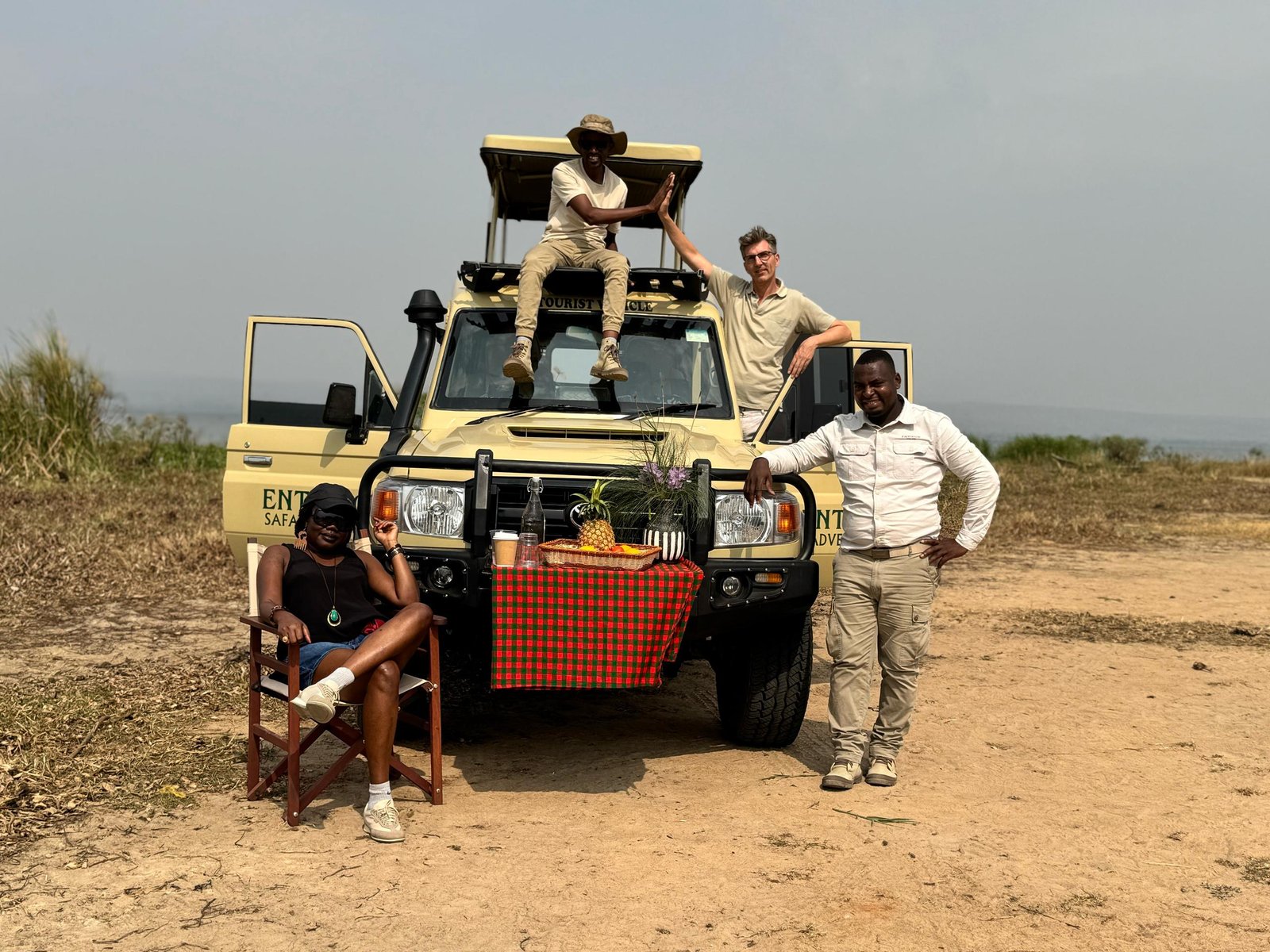 Group of tourists on a game drive at Entikko Safari Lodge in Murchison Falls National Park, Uganda