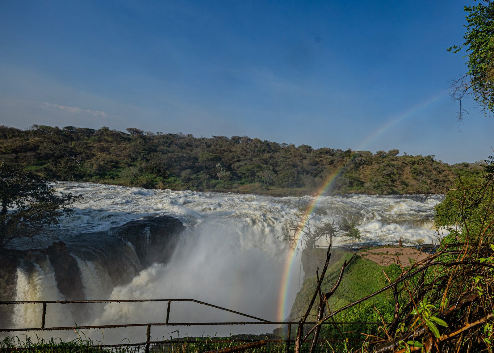 Rainbow appearing over Murchison Falls near Entikko Safari Lodge