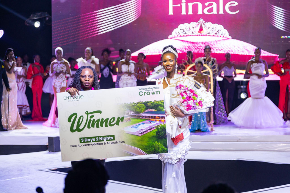 1st Runner-Up Kirabo Faith receiving her winners prize from Entikko Safari lodge